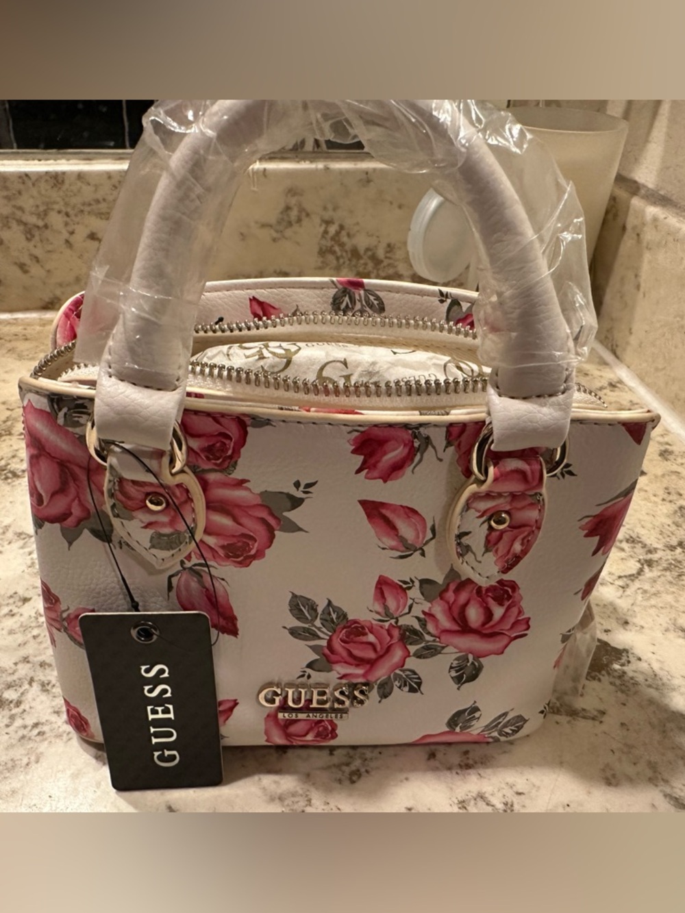 GUESS White Satchel with Pink Rose Print and Gold Hardware